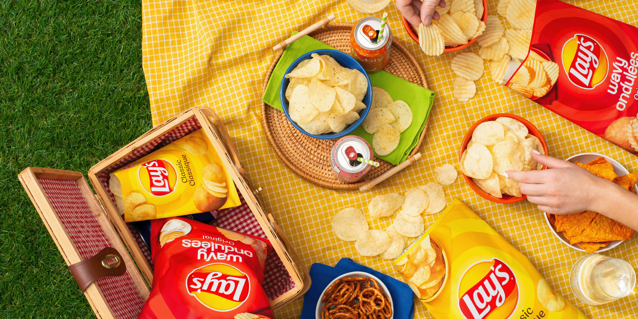 Lay's chips laid out at a picnic